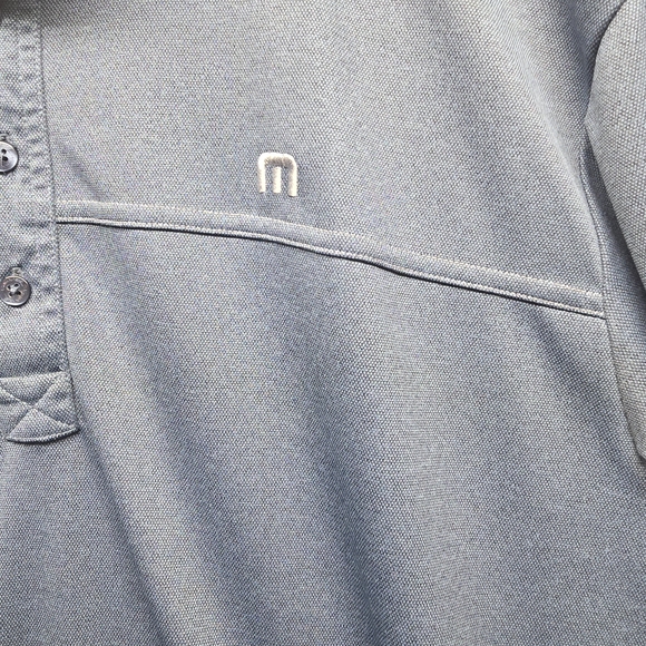 Travis Mathew Heathered Navy Short Sleeve Performance Polo - Picture 3 of 7